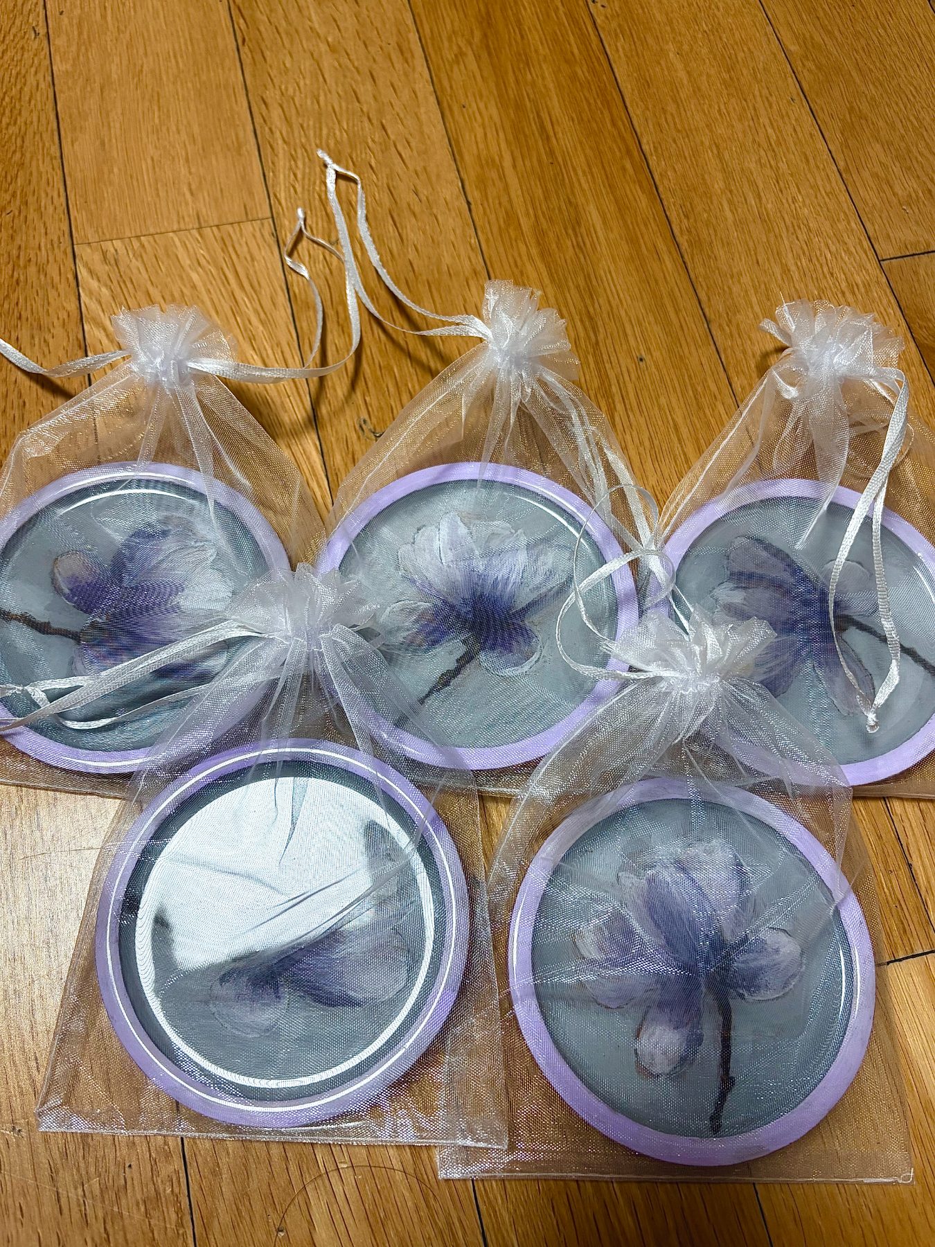 Magnolia coasters in organza bags