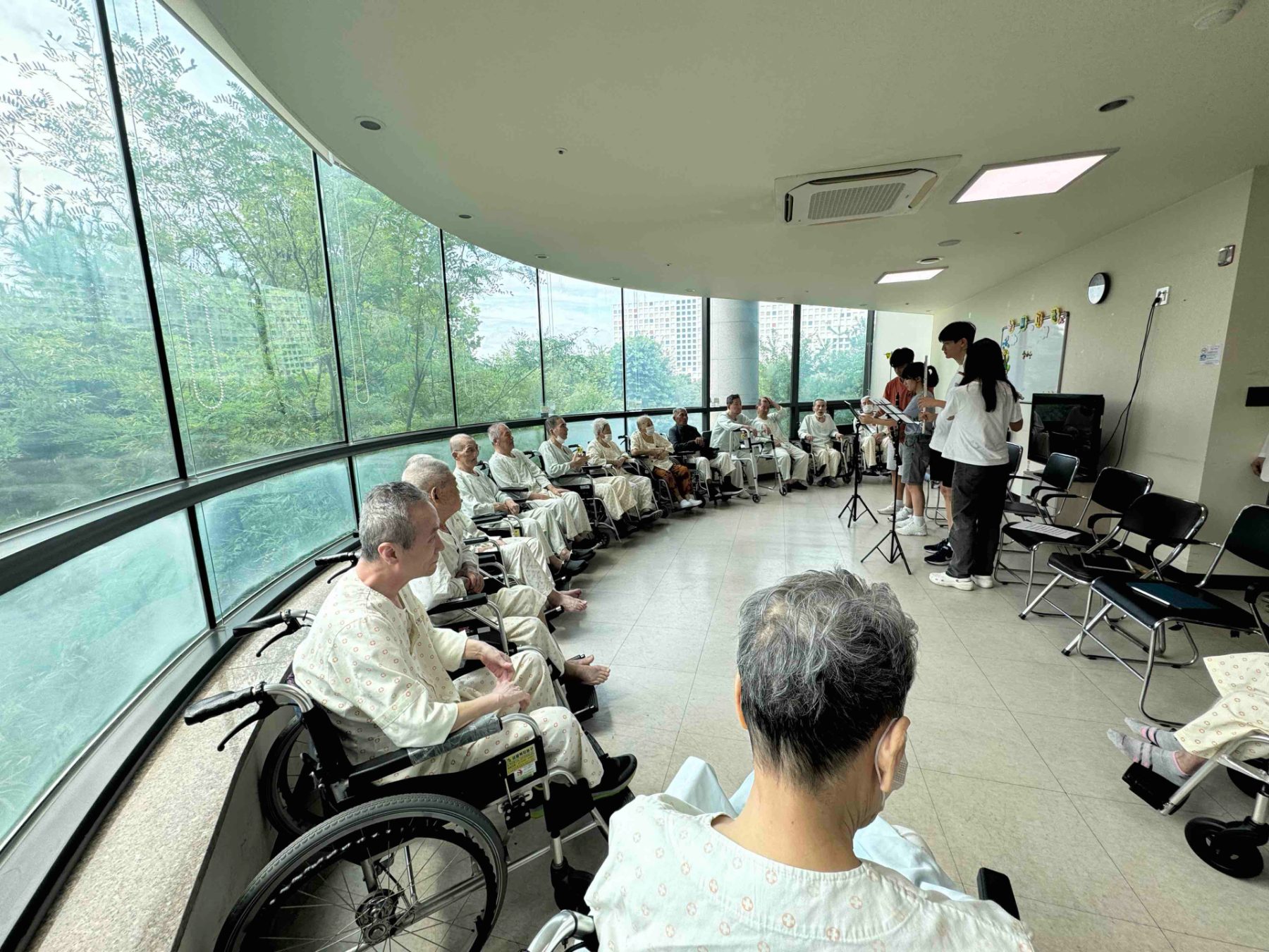 Playing the flute at Bundang Yonsei Convalescent Hospital