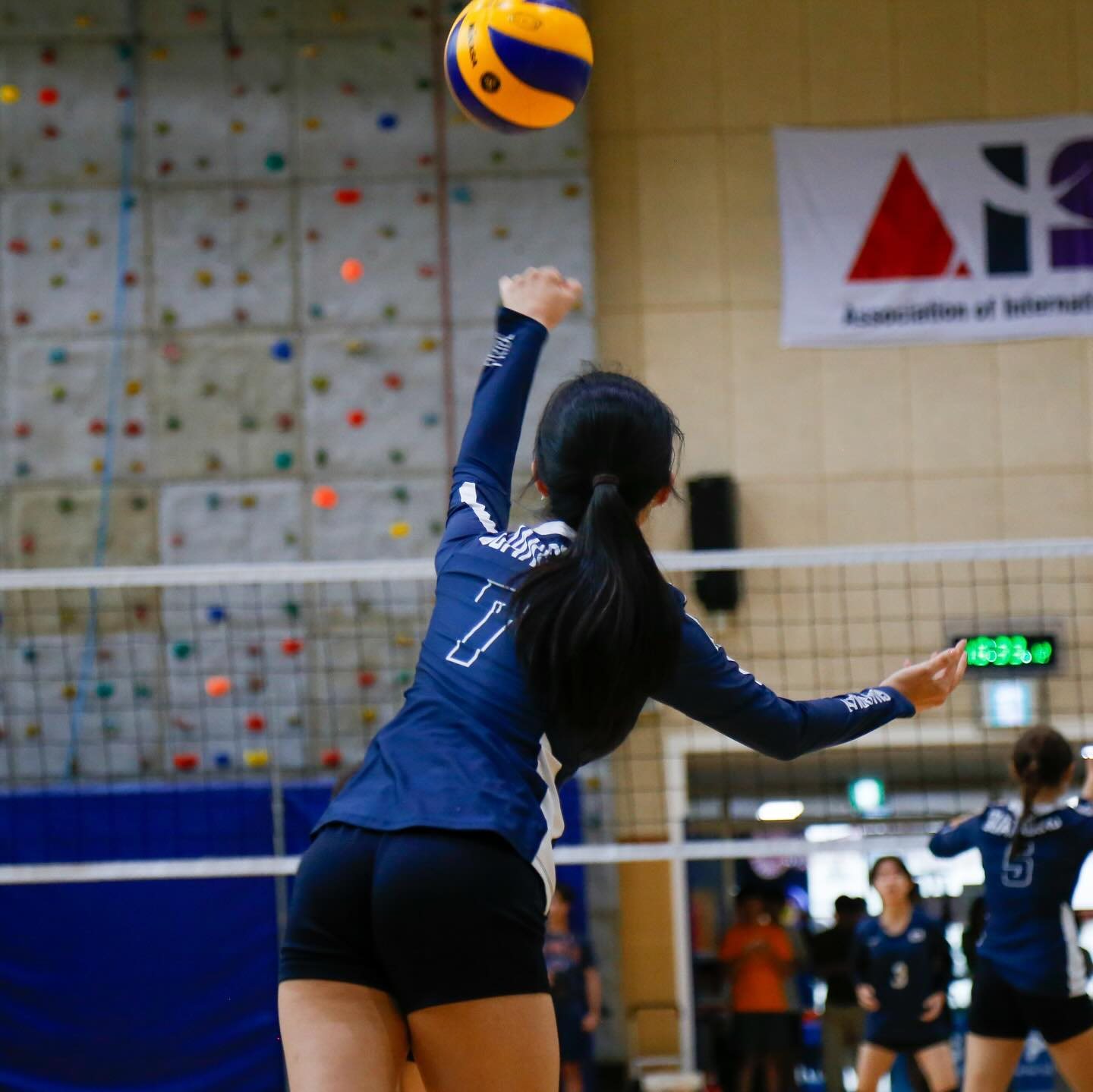 Spiking a volleyball